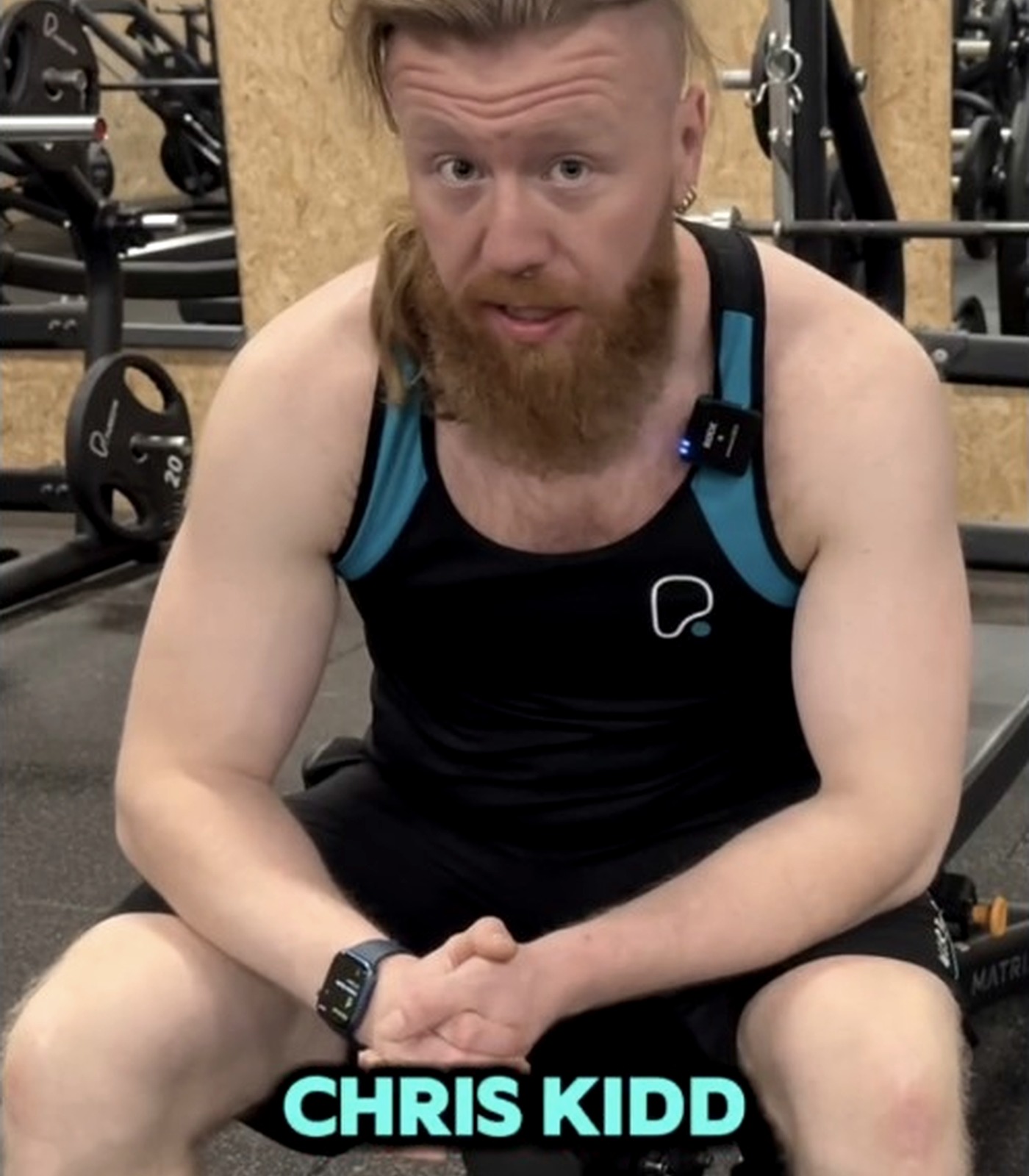 Chris Kidd coaching in a gym